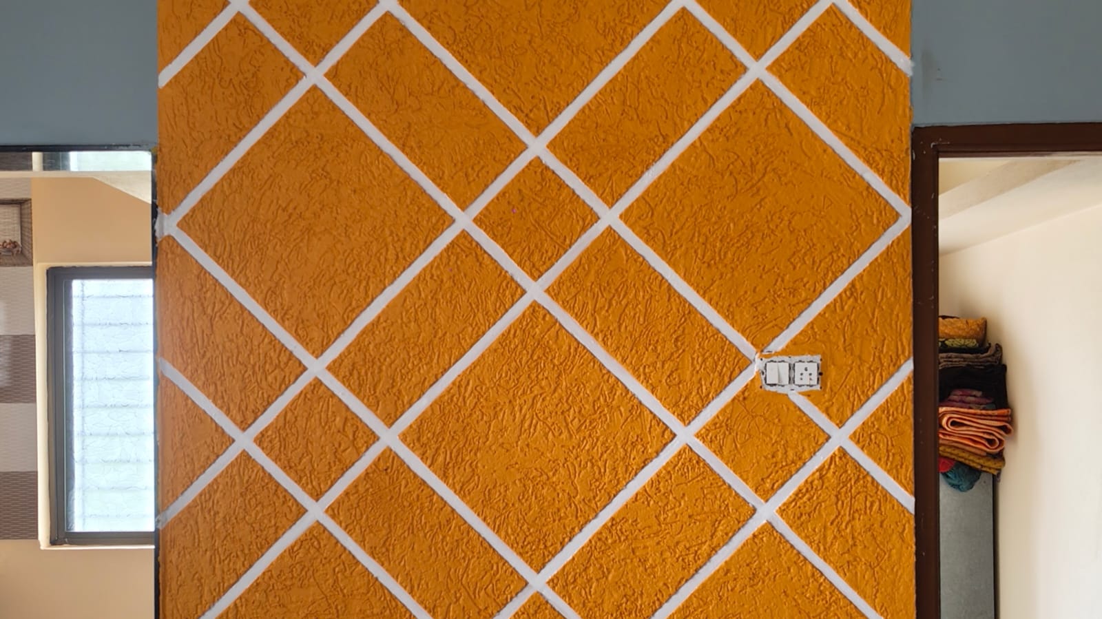 Creative Diamond Pattern Wall Design in Orange Texture | Modern Accent Wall Idea | Swapnapurti Paints